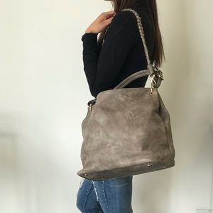 Stone wash hobo bag.